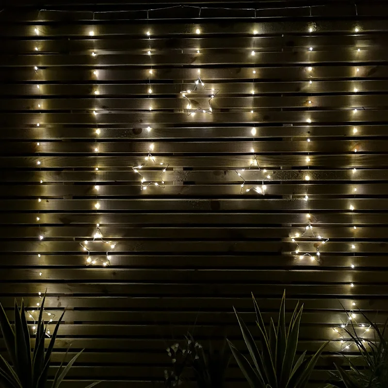 1.2m Battery Operated Christmas Star Curtain Lights with 140 Warm White LEDs