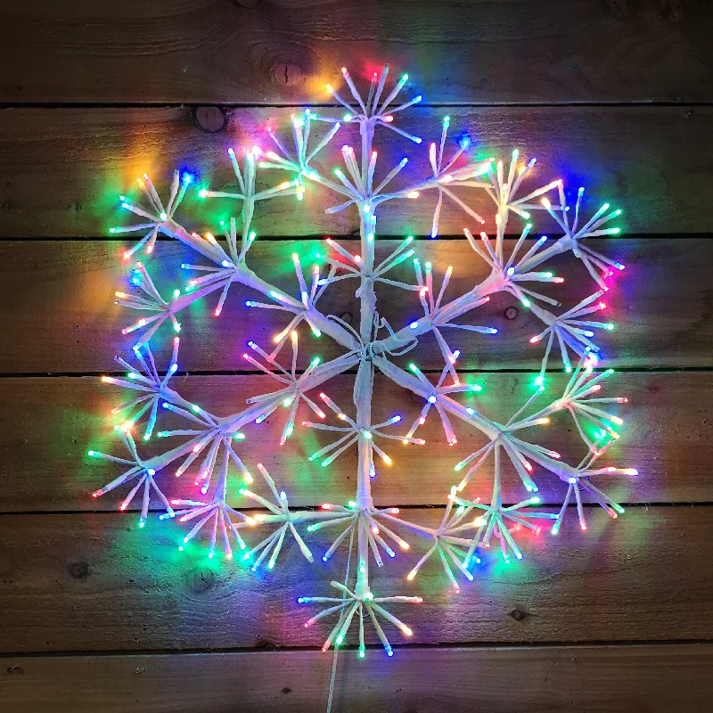 60cm Premier White Starburst Christmas Snowflake, Multi Coloured twinkling lights.